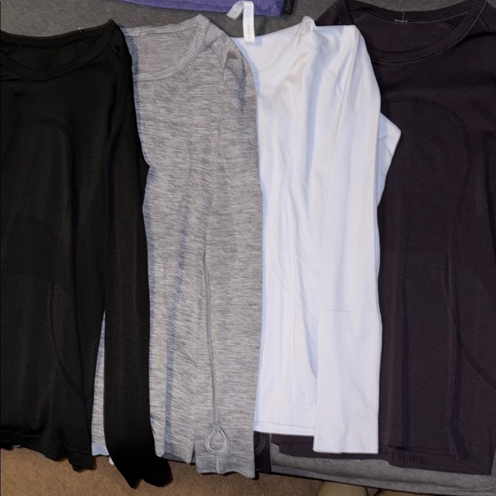 Set of Four Lululemon Long Sleeve Shirts - Black, Gray, Light Blue, Plum Purple